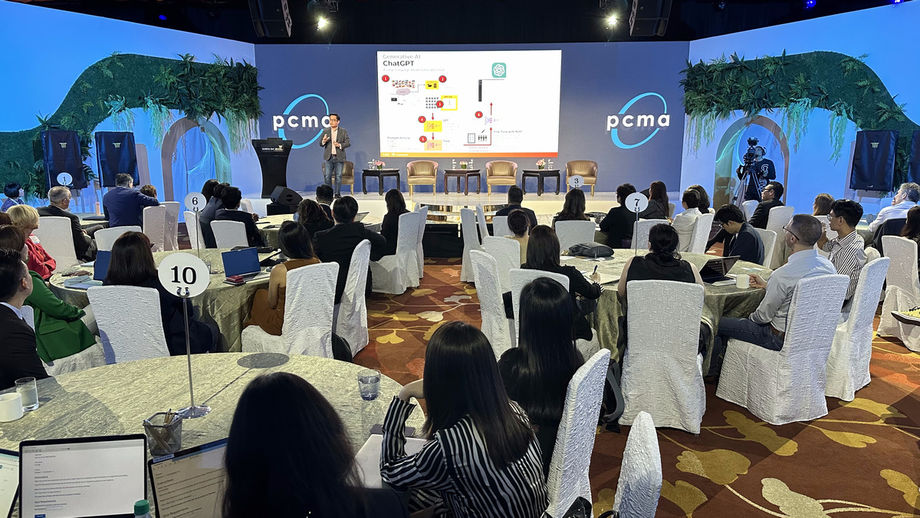 Attendees at PCMA Labs listening to AI Singapore’s Lawrence Liew.