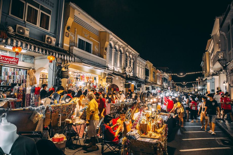 A night shopping scene in Thailand: the country is aiming to become an international medical hub.