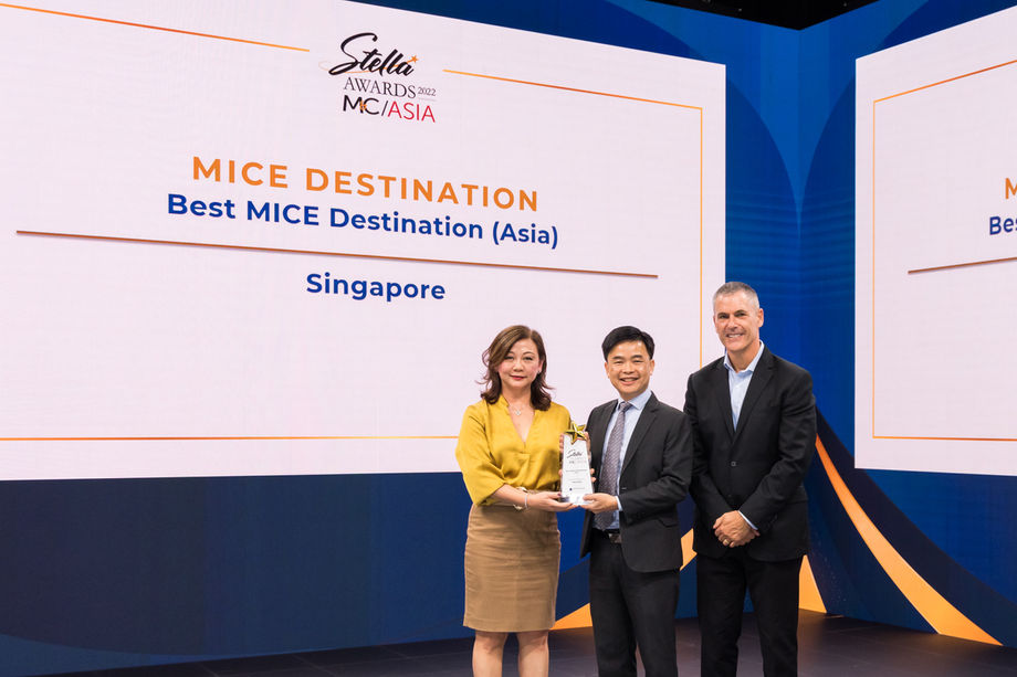 Northstar Travel Group’s Irene Chua [left] and Northstar Meetings Group’s David Blansfield [right] conferring the award for Best MICE Destination (Asia) to Singapore Tourism Board’s Yap Chin Siang [centre].
