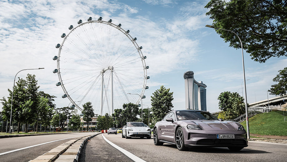 Guiding the convoy of Porsche cars through the city required facilitation from various local government agencies to ensure a safe and smooth travel.