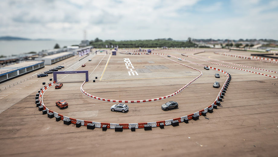 With no permanent race circuit venue, Porsche worked with the Changi Exhibition Centre to build a bespoke test track for dealers that was safe and logistically precise.