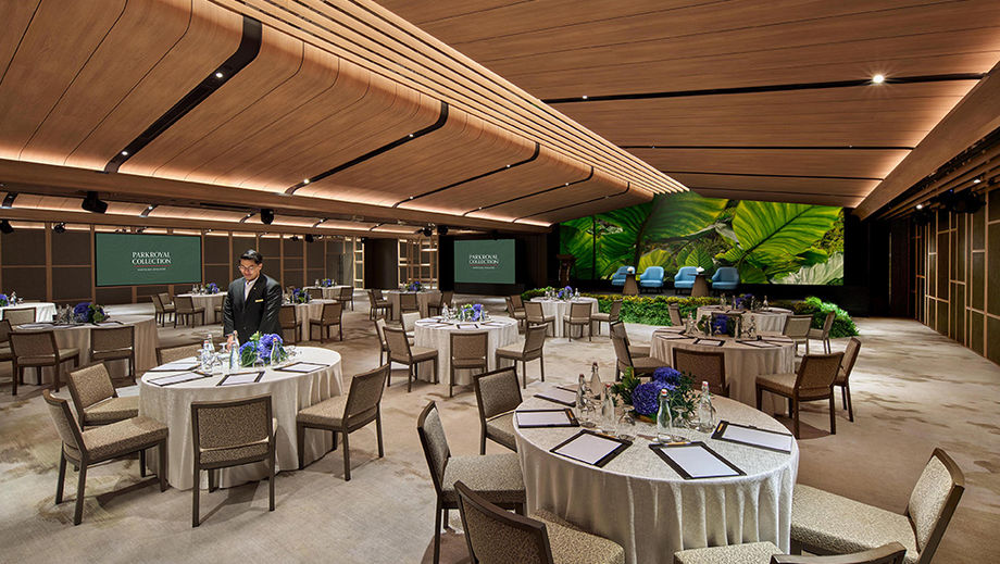 Water is served to delegates in refillable glass carafes that cut plastic waste while adding elegance to the table setting.