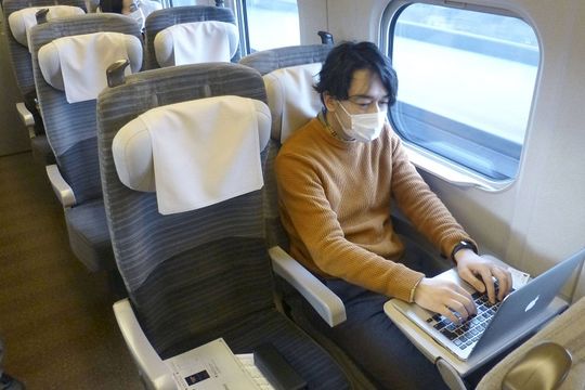 Japan's business makers are checking into bullet trains