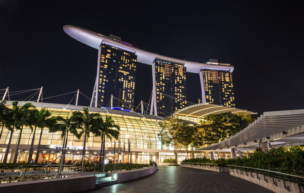 Gardens by the bay and Marina Bay Sands hotel, Singapore Stock