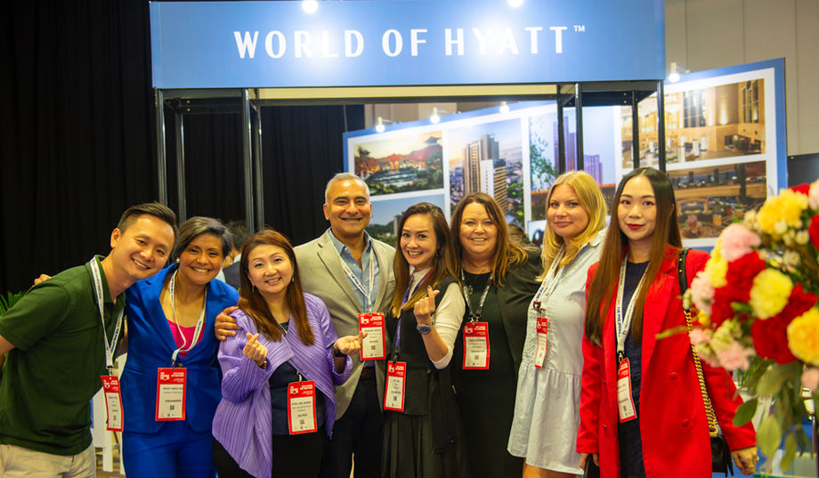 Hyatt’s Ivy Lim (centre) with partners at World of Hyatt booth during The Meetings Show Asia Pacific 2024 in Singapore.