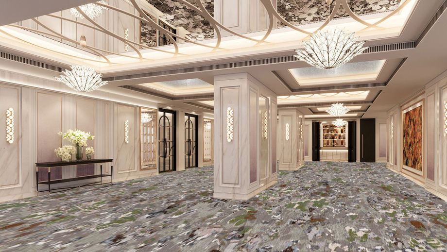The refreshed foyer features a new built-in bar for pre-function cocktails, enhanced with live drink showmanship and botanical-themed design elements that complement the ballroom.