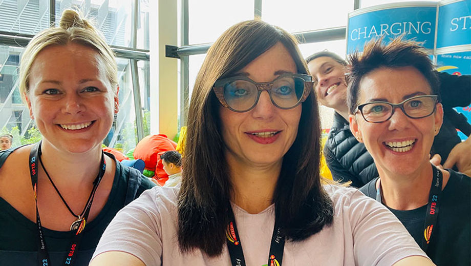 After three years of online meetings, Don’t Forget The Bubbles co-founder Tessa Davis (centre) meets her tribe in Brisbane during the in-person conference.