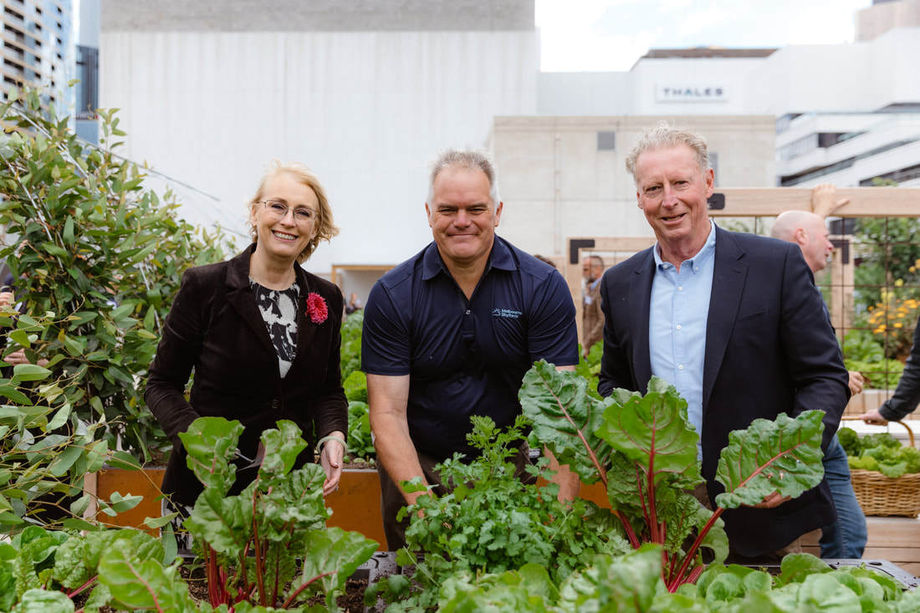 Lord Mayor Sally Capp; Brendan Condon, director of Melbourne Skyfarm; and Peter King, CEO of Melbourne Convention Exhibition Centre at the launch of the rooftop farm.