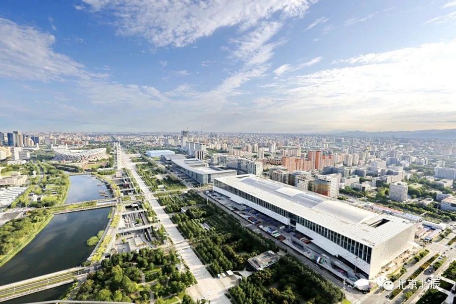 Phase two of the China National Convention Center joins the original venue, which was also a media centre and host to some events for Beijing's 2008 Olympic Games.