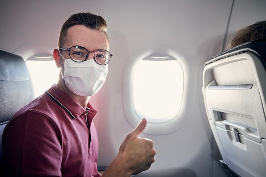 IATA recommends staying safe on long-haul flights by keeping masks on.