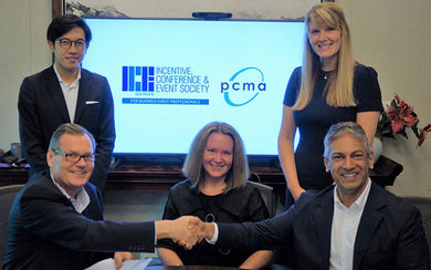(Left to right) Nigel Gaunt, President, ICESAP, shakes hands with Sherrif Karamat, CEO, PCMA, while Claire Smith, Chair, PCMA Board of Directors, sits in the middle. They are joined by (standing) Philip Pang, Marketing & Membership Manager, ICESAP, and Michelle Crowley, PCMA’s Senior Director of Global Strategy.