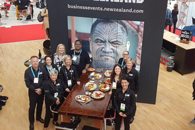 The team gathers around the Korero & Kai table.