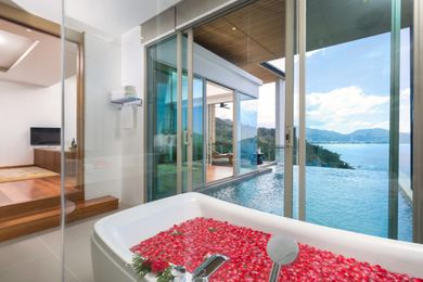 Get the VIP experience with a grand floating breakfast served in a private pool villa at Wyndham Grand Phuket Kalim Bay.