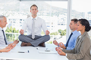 business-people-meditating-istockphoto