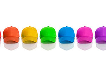 rainbow-of-baseball-caps-adobestock-111437855