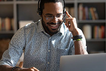 man-on-a-videoconference-fizkes-adobestock-367589421