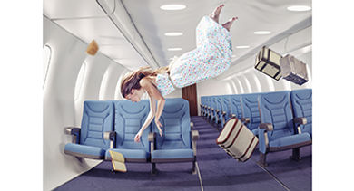 woman-floating-in-a-plane