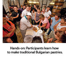 Participants making Bulgarian pastries.