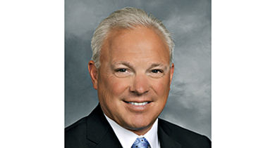 Greg-Champion-president-COO-benchmark