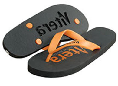 Neet Feet's logoed flip-flops
make a definite impression.