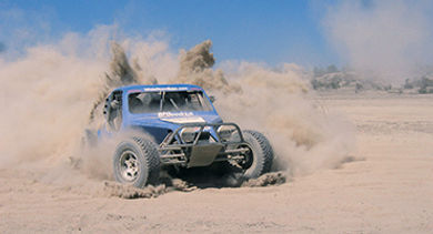 Kicking up some sand: Groups at Esperanza, An Auberge Resort, can race across the desert near Cabo San Lucas, Mexico.