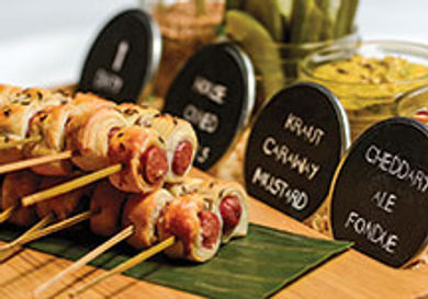 Abigail Kirsch's "pigs in a fancy blanket'
give this classic crowd-pleaser a gourmet flair.