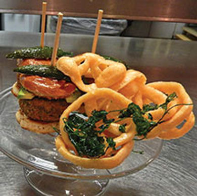 Crispy pig-tail patty with serrano aioli is a new
favorite at Loews Santa Monica Beach Hotel.