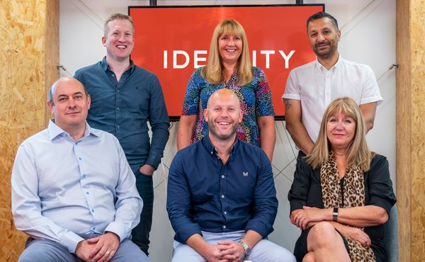 Front row (L-R): Simon Dunnell, Board Director; Michael Gietzen, CEO; Janet Dodd, Chief Strategy Officer Back row (L-R): Paul Fitzpatrick, MD; Mary Carter-Lee, People & Culture Director; Kal Bhadresa, Finance Director