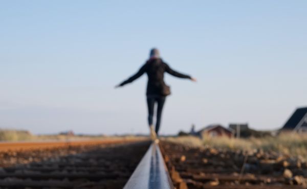 balancing act - unsplash