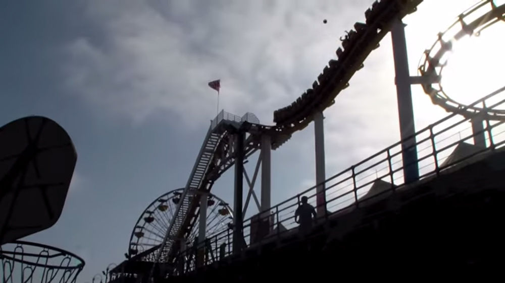 WATCH Trick Basketball Shot from Moving Roller Coaster TravelPulse