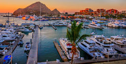 Cabo San Lucas Marina at sunset (Photo via LindaYG / iStock / Getty Images Plus)