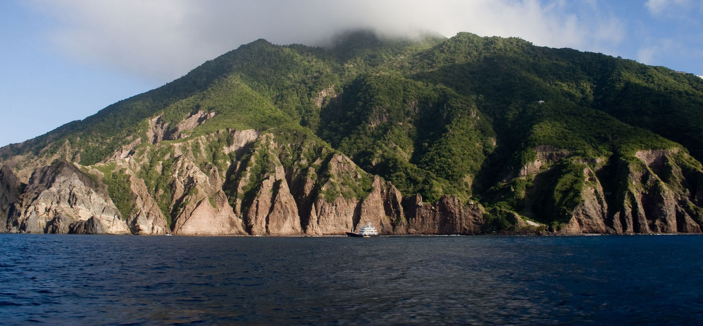 Image: The Caribbean has extraordinary islands, with few tourists visiting, but offering incredible experiences amidst great nature. (Photo via steeric / iStock / Getty Images Plus).