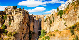 Panoramic view of the old city of Ronda, one of the famous white villages in the province of Malaga, Andalusia, Spain (photo via MarquesPhotography / iStock / Getty Images Plus)