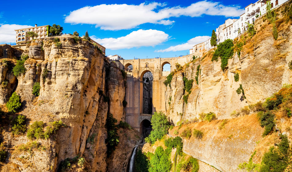Panoramic view of the old city of Ronda, one of the famous white villages in the province of Malaga, Andalusia, Spain (photo via MarquesPhotography / iStock / Getty Images Plus)