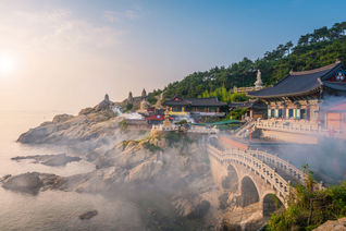 Haedong Yonggungsa Temple in Busan, South Korea. (photo via Reabirdna / iStock / Getty Images Plus)