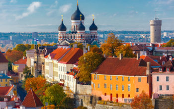 Toompea hill with tower Pikk Hermann and Russian Orthodox Alexander Nevsky Cathedral, view from the tower of St. Olaf church, Tallinn, Estonia (photo via KavalenkavaVolha / iStock / Getty Images Plus)