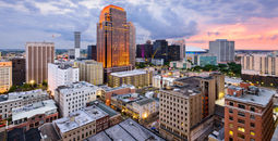 New Orleans, Louisiana, USA CBD skyline at night. (Sean Pavone / iStock / Getty Images Plus)