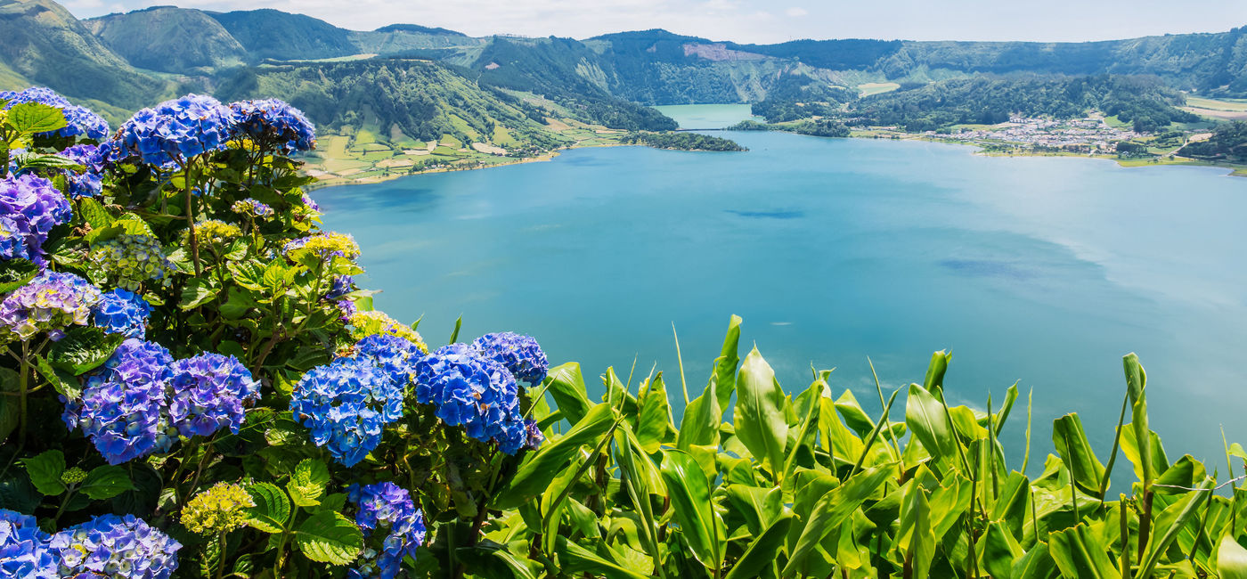 Image: Lake of Sete Cidades in the Azores, Portugal. (photo via VickySP / iStock / Getty Images Plus)