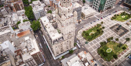 Montevideo, Uruguay, aerial view of downtown buildings and Plaza Independencia square. (photo via rmnunes / iStock / Getty Images Plus)