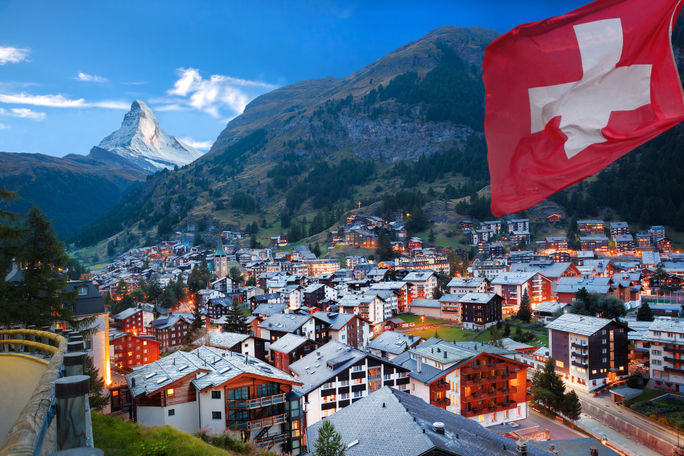 Zermatt village with view of Matterhorn in the Swiss Alps Famous Zermatt village with the peak of the Matterhorn in the Swiss Alps (photo via extravagantni / iStock / Getty Images Plus)