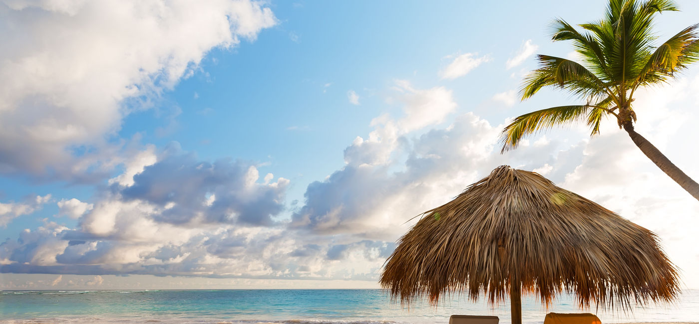 Image: PHOTO: Beach chairs with umbrella and beautiful beach in Punta Cana, Dominican Republic. (photo via Preto_perola/iStock/Getty Images Plus) (Preto_perola / iStock / Getty Images Plus)