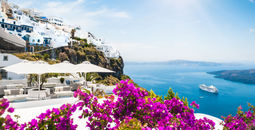 Santorini island, Greece. Beautiful view on the sea (photo via Olga_Gavrilova / iStock / Getty Images Plus)