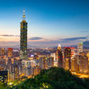 View of the Taipei Skyline with Taipei 101 at night (photo via Sean3810 / iStock / Getty Images Plus)