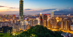 View of the Taipei Skyline with Taipei 101 at night (photo via Sean3810 / iStock / Getty Images Plus)