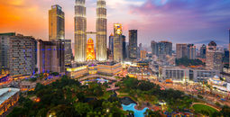 Petronas Towers, also known as Menara Petronas is the tallest buildings in the world from 1998 to 2004. (photo via Rat0007 / iStock / Getty Images Plus)