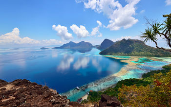 Scenic view of Bohey Dulang Islands, and ancient volcano in Tun Sakaran marine National park, Semporna, Sabah Borneo, Malaysia.  (photo via Cn0ra / iStock / Getty Images Plus)