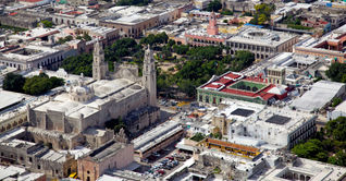 Aerial view of downtown Merida, Yucatan's city square and cathedral. (photo via segarza / iStock / Getty Images Plus)