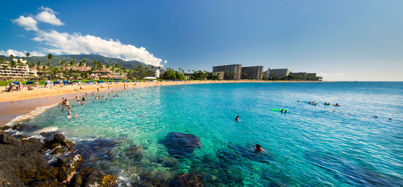 Image: Kaanapali Beach from Black Rock, Maui, Hawaii. (photo via 7Michael / iStock / Getty Images Plus)