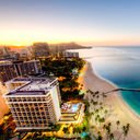 Sunrise at Waikiki Beach, Hawaii (photo via Andy_Tam / iStock / Getty Images Plus)