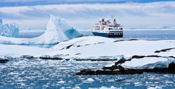 Big cruise ship in the Antarctic waters (Photo via goinyk / iStock / Getty Images Plus)